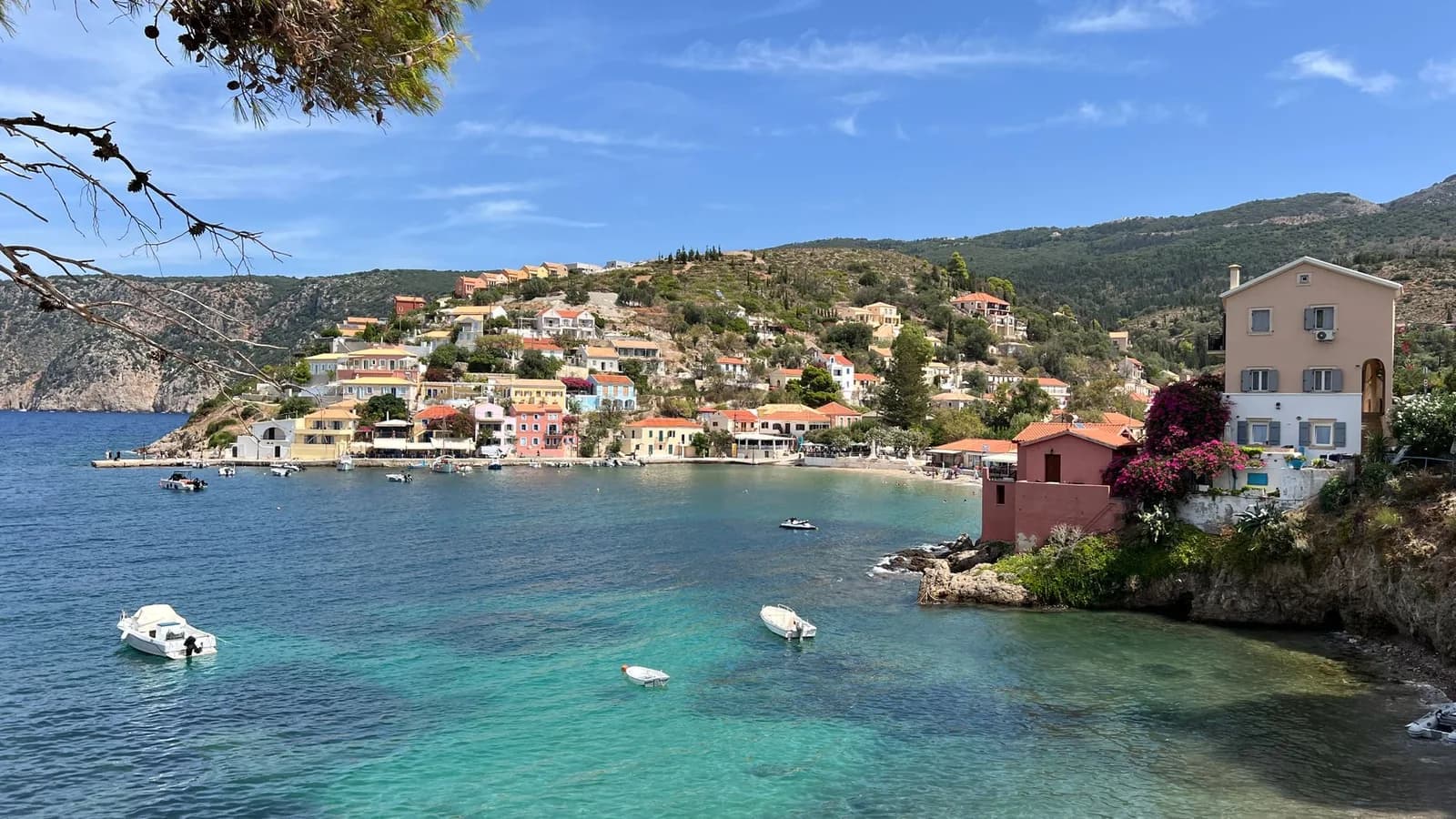 The pastel houses and sheltered bay of Assos on the north-west coast of Kefalonia
