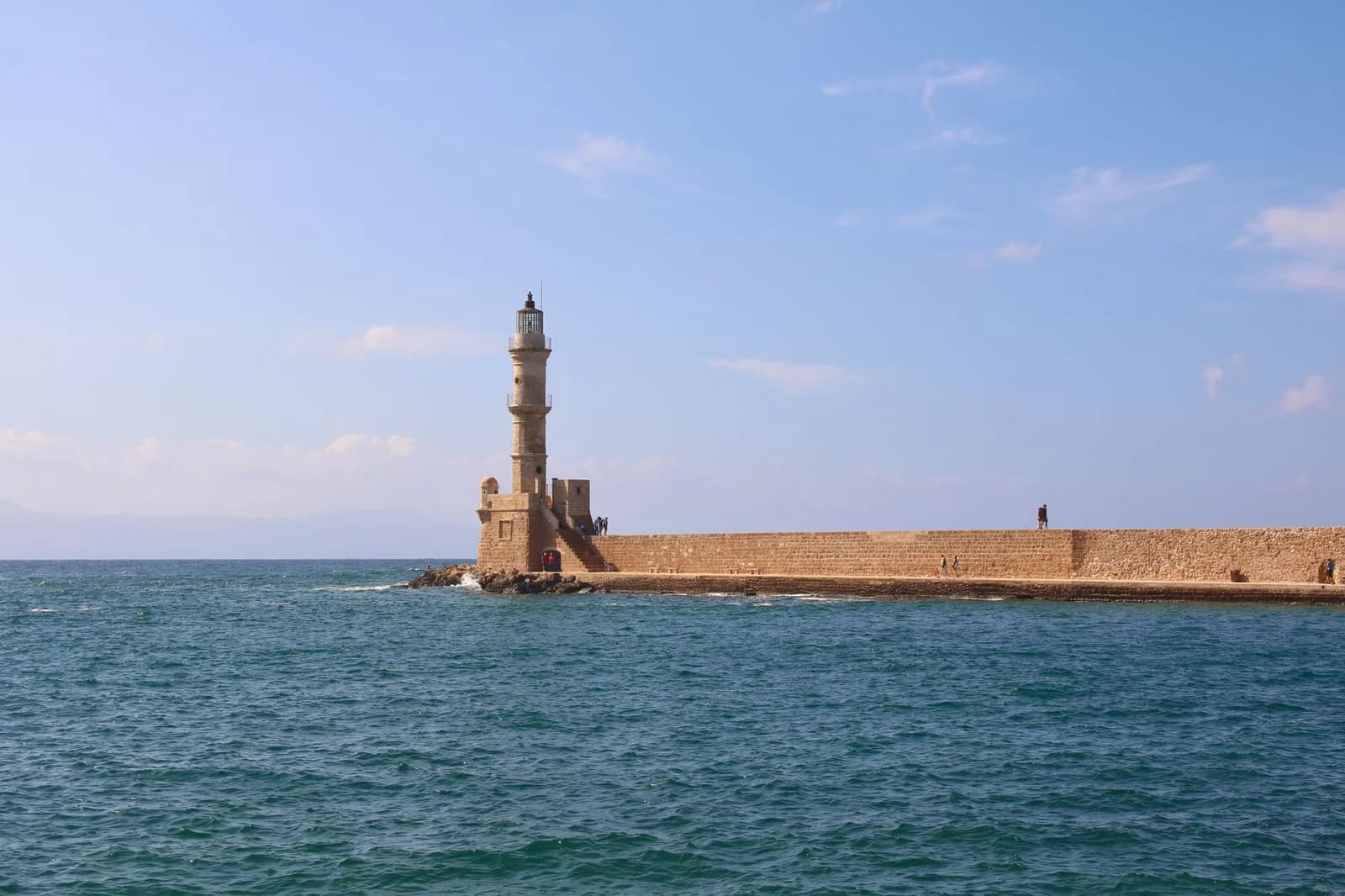 The Venetian lighthouse at the mouth of the old harbour in Chania, western Crete