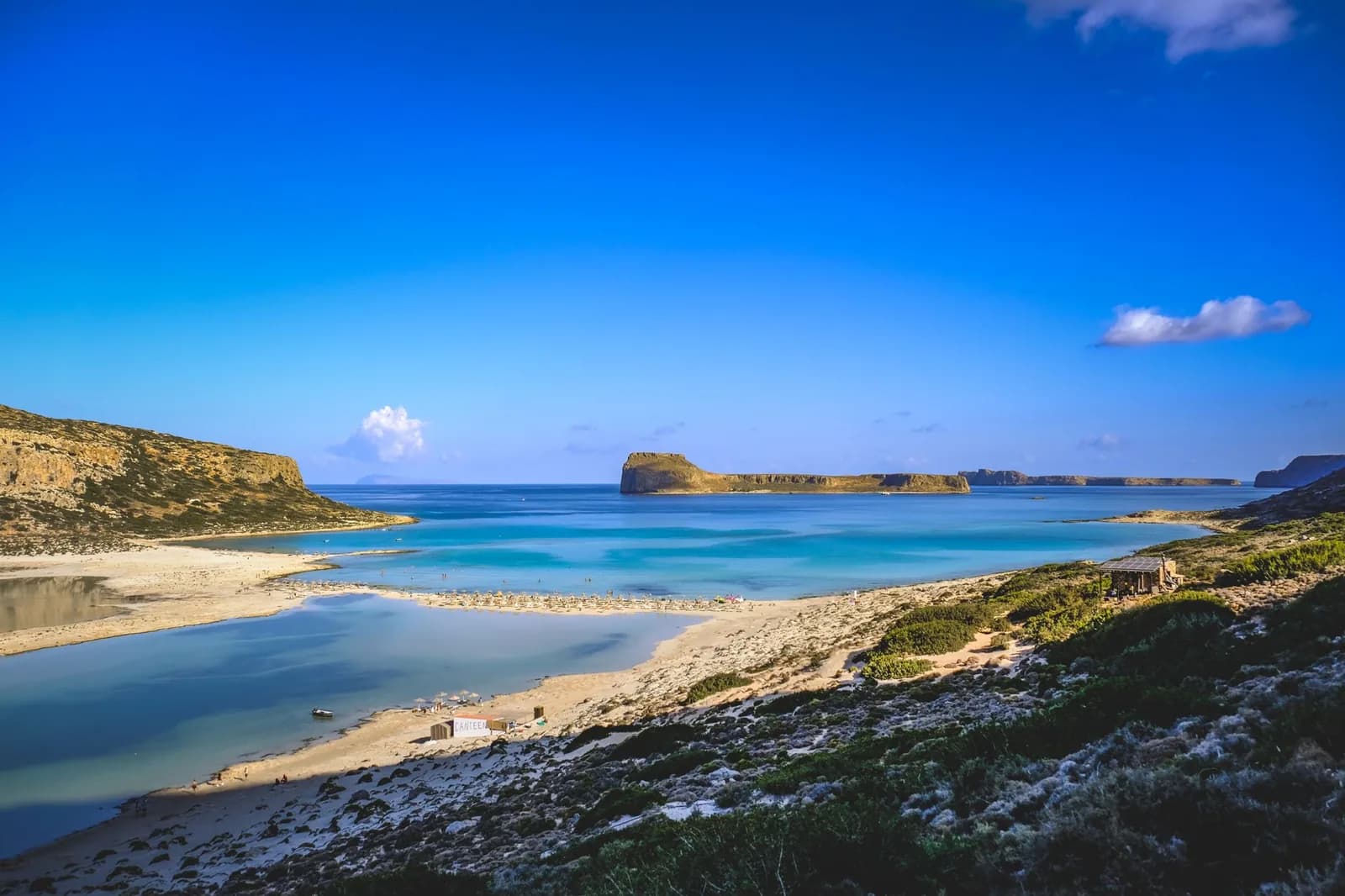 The Balos lagoon at the north-western tip of Crete, with the sandbar, the shallow turquoise water and the flat rock of Imeri Gramvousa offshore