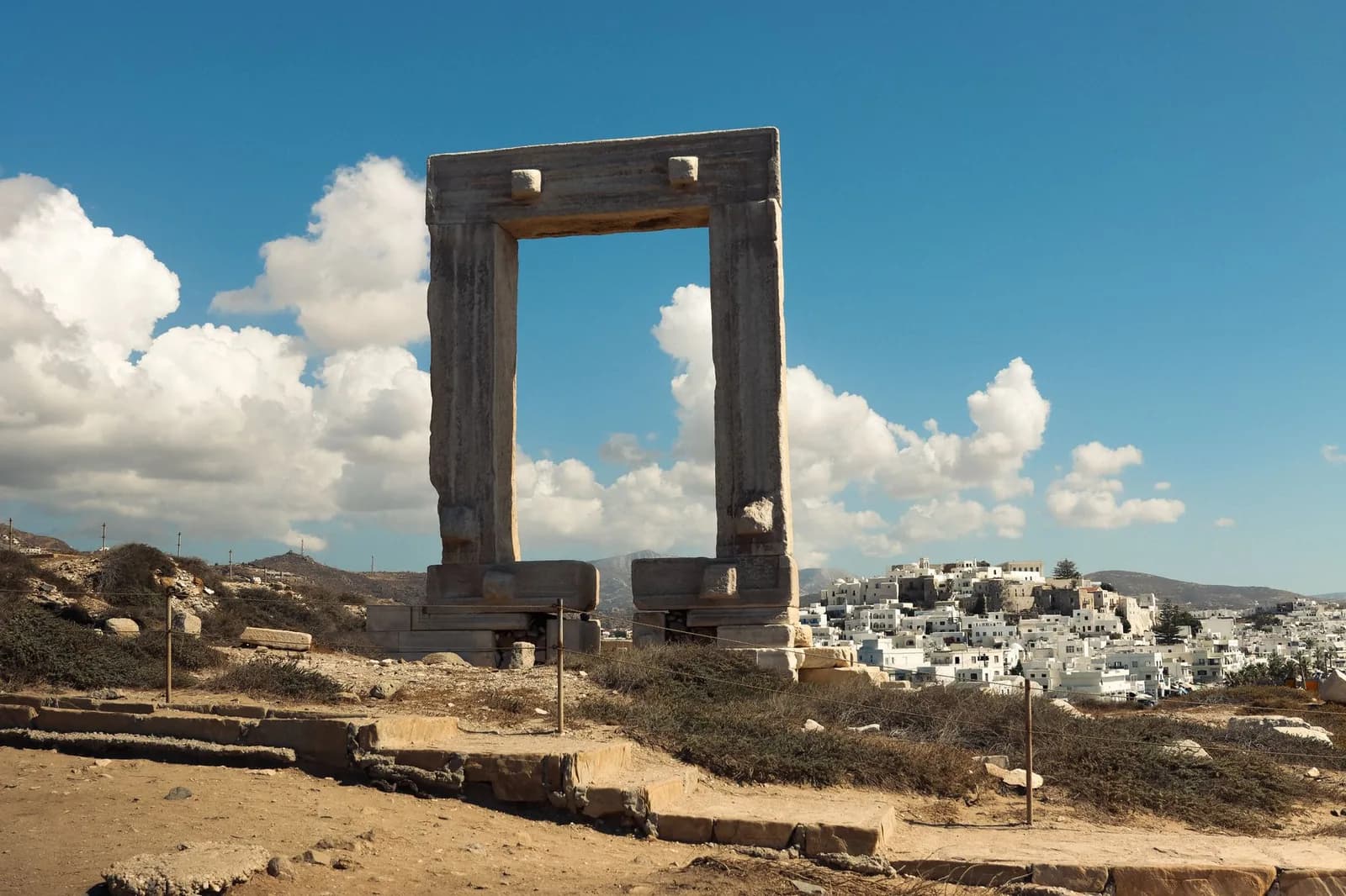 The Portara, the marble doorway of the temple of Apollo, standing above Naxos Chora in the Cyclades